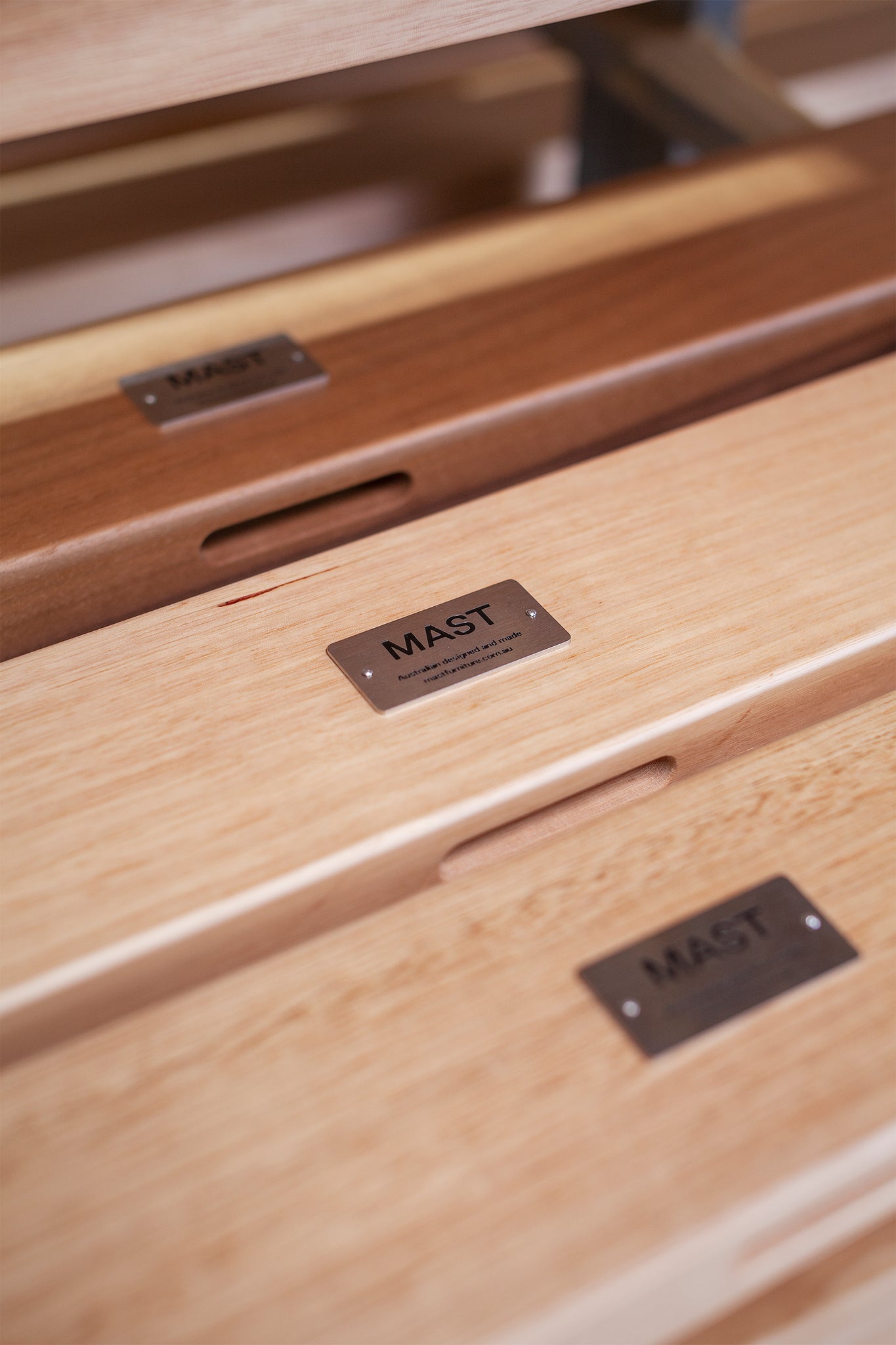 Nameplate of Mast Furniture on finished pieces 
