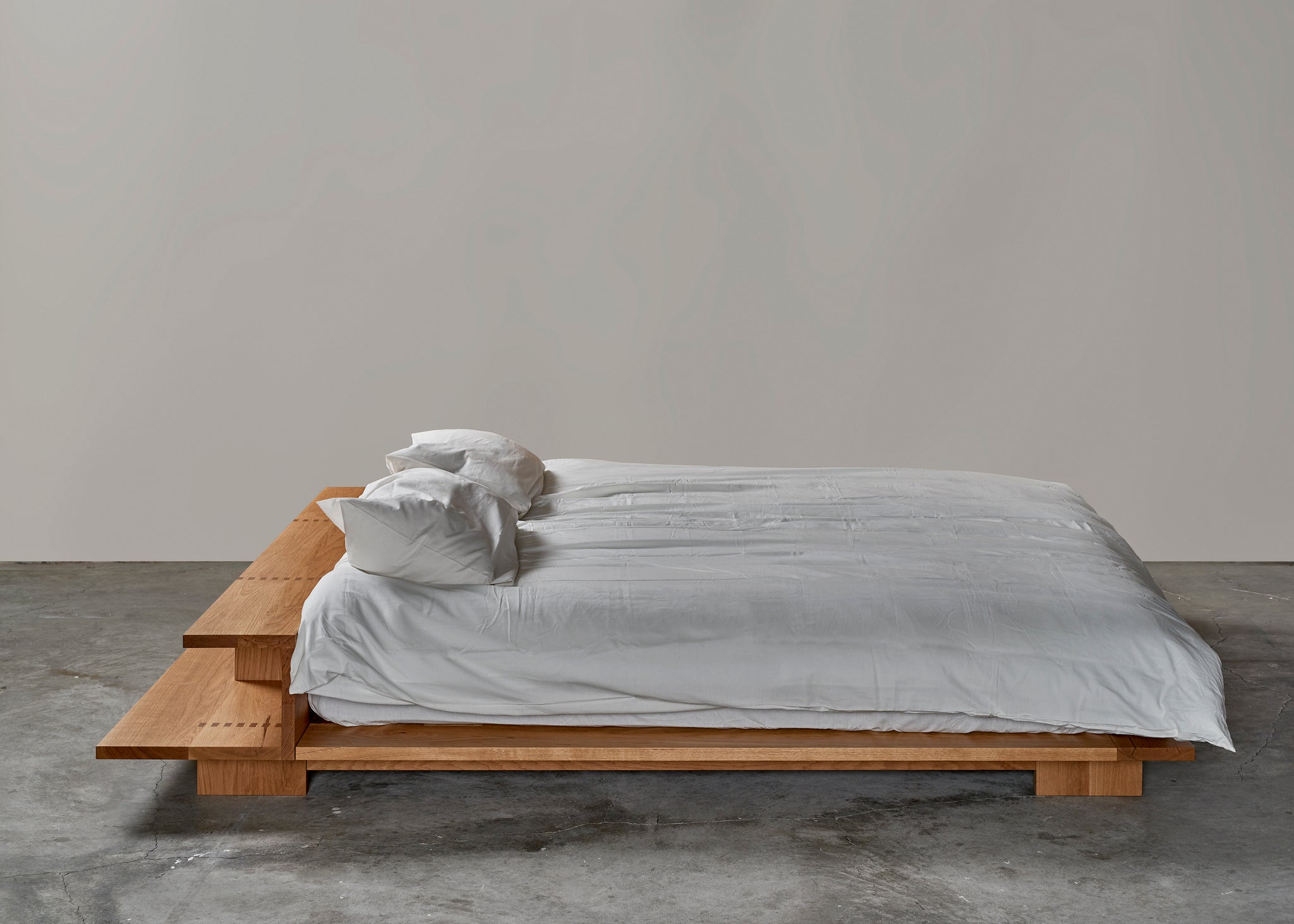Ostinato Bed detail in American Oak. A luxurious, handmade timber bed. 