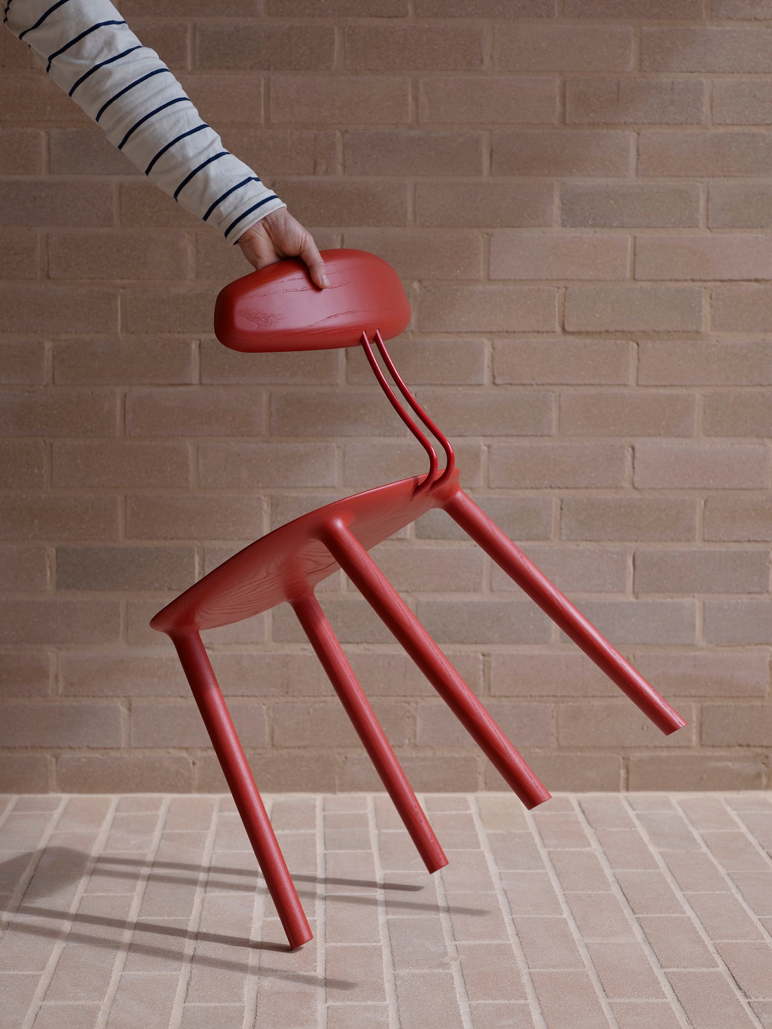 Stem chair in red by Mast Furniture