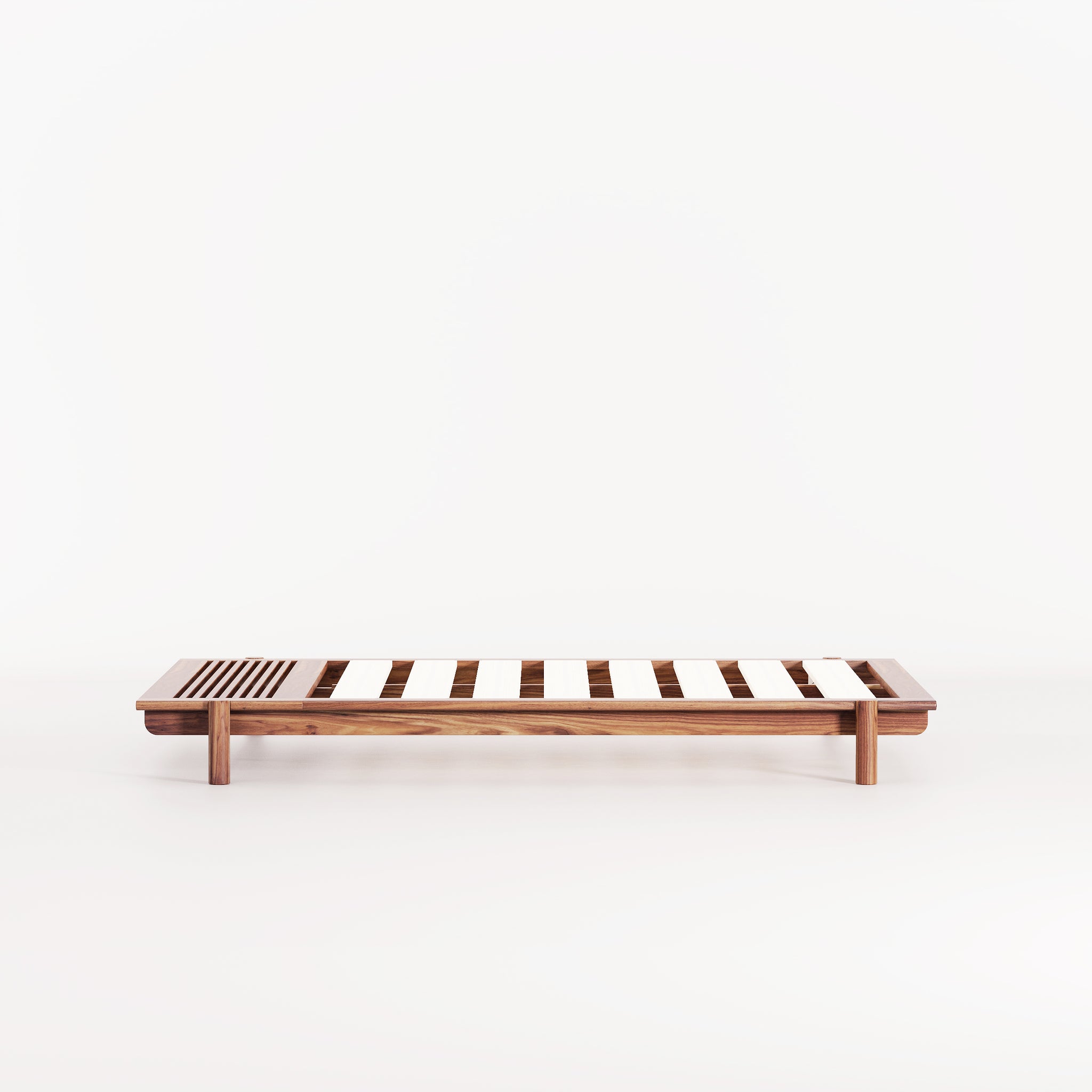 A beautiful, modern, Australian made timber platform bed with built-in bench seat.